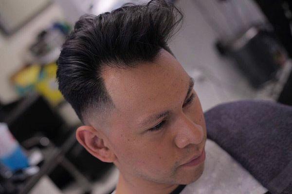 Precision men's haircuts and styling.