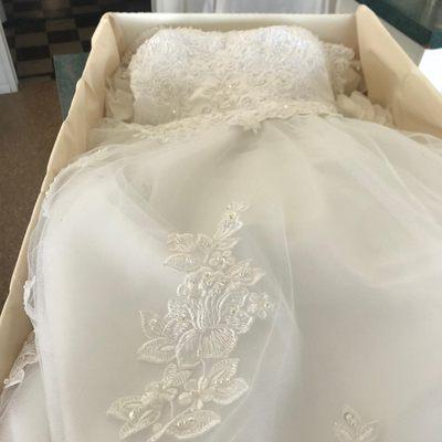 We offer top-notch wedding dress cleaning and preservation services.