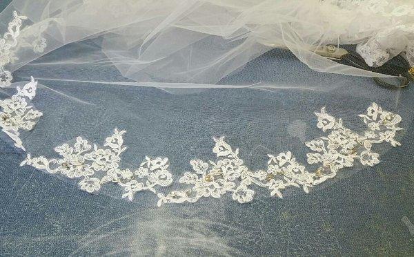 Custom made vail with matching lace from the wedding gown