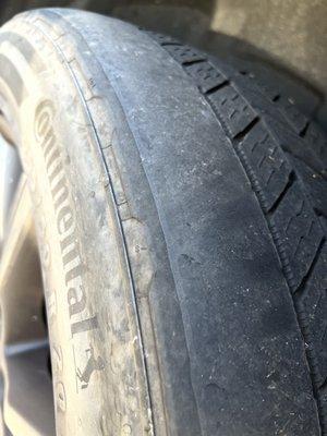 Brand new tire tread after 8 months of driving w their bad alignment.  They wouldn't replace the tires.