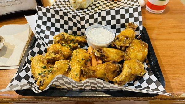 Spicy Garlic Parmesan and Spicy Honey Garlic wings with blue cheese