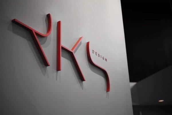 rks-design-logo-on-wall-industrial-design