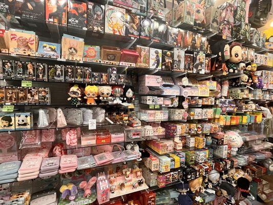 anime figures, keychains, surprise boxes, plushies, my favorite shelf!