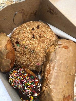 Maple log, cake donuts, cinnamon bun with topping