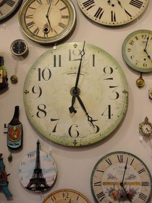 A 31" wall clock from Timeworks is beautiful as well as functional.  It has antique brass accents and runs on a AA battery.