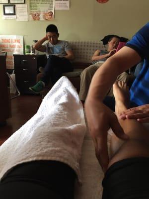 Foot massage---all the way up to the knee