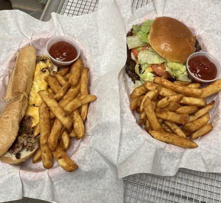 Cheesesteak and cheeseburger both come with fries and ketchup