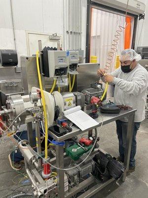 Juan wiring up VFD'S at Mochi Ice Cream for a new (RTE) Line Ready To Eat...