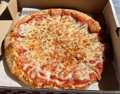 Personal cheese pizza - soft crust, fresh cheese and a lightly seasoned sauce. I'm a fan of