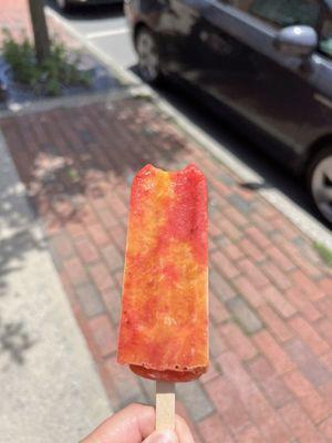 Passion fruit ice pop (with a small bite taken out of it)