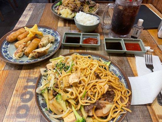 Noodles, egg rolls, fried chip thingies and potstickers.