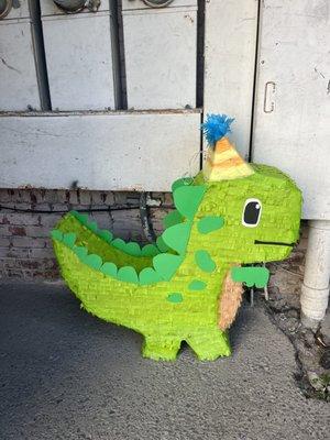 Baby dinosaur piñata