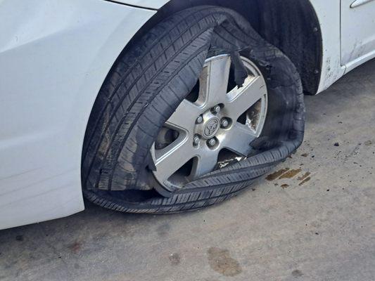 Not my tire, but watched someone drive in with this - crazy!