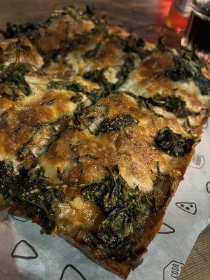 San Danielle Sicilian pizza with three cheeses, mushroom, spinach and garlic