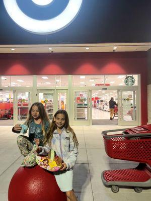 Kids in front of Orange County Target happy with their toys.