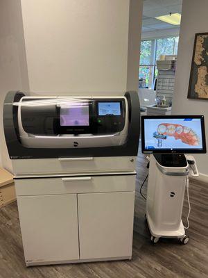 This is our 3D intra-oral scanner & 3D crown milling machine! you can get your crowns the same day in our office!