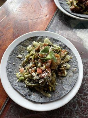 Chicharron and nopales taco