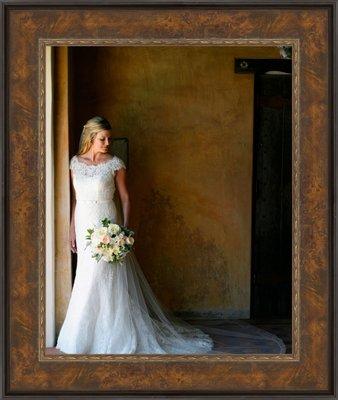 This is a gorgeous 3 inch wide brown veneer frame with a decorative gold inner lip. It is made of wood and made in the USA.