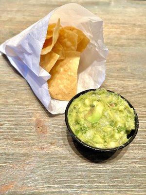 Chips & Guacamole. Crunchy, chips. Freshly made guacamole with nicely sized chunks of avocado. It's a great side dish.