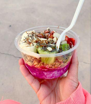 Pitaya bowl with fruit toppings and honey granola! Yummy!