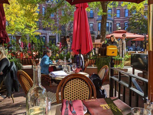 Beautiful outside seating on a charming street in beautiful Boston.