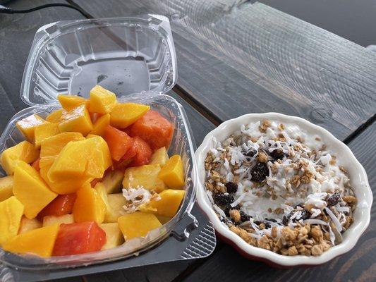 Fruit salad; mango, papaya, and pineapple. Cottage cheese, granola, coconut flakes and honey :) delicious!