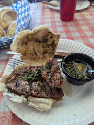 Argentinian chorizo sandwich with chimichurri sauce.