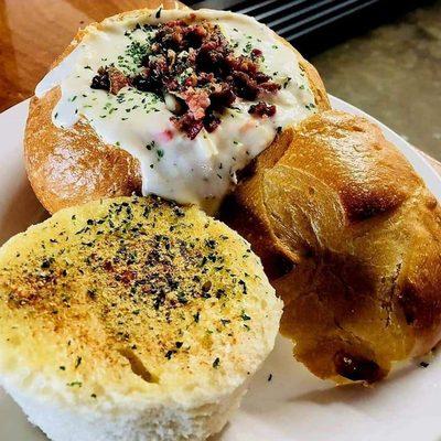 Clan chowder in a bread bowl