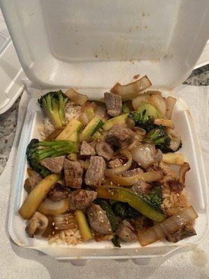 Teriyaki steak with zucchini and onions added