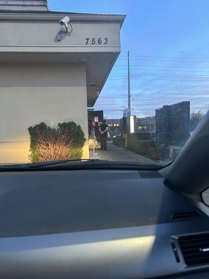 Staff ignoring customers and looking at a sunset.