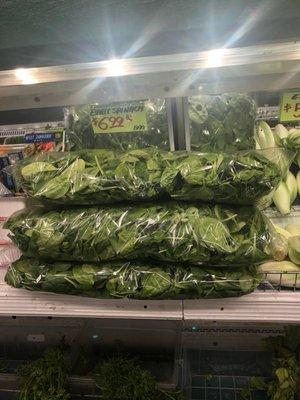 A ton of Spinach longer than my forearm at $6.99 a bag. Okay, I'll wash it myself.