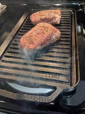 Trying out our Lodge Cast Iron chef-style reversible griddle/grill from Williams-Sonoma for the first time.