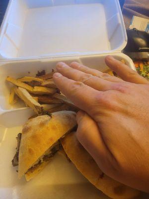 This is a full size French dip. No joke, my hand is for scale. Nothing had been consumed, yes, that is the full order of a side of fries.