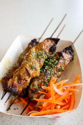 Grilled Pork Meat on a stick. House special marinated grilled pork.