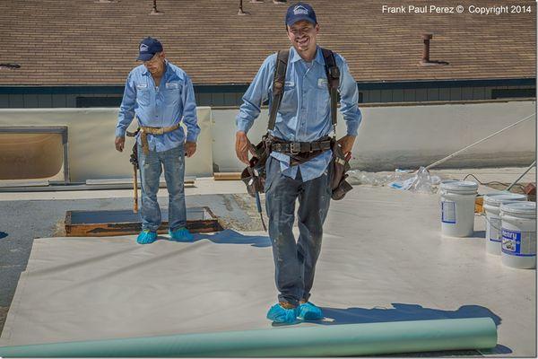 Charles and Francisco working on Fibertite Roof