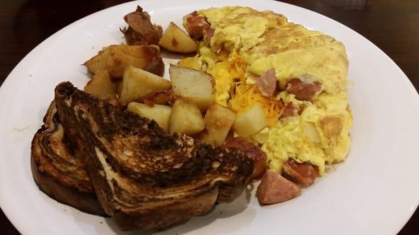 Polish omelet with home fries and rye toast.