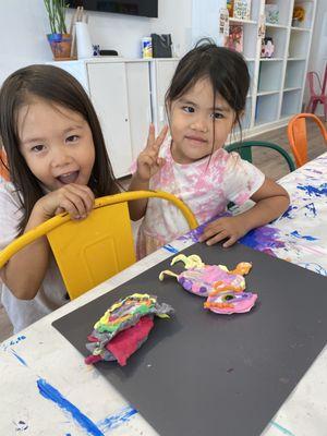 Little artist at Open Studio. They made clay creatures.