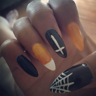 Halloween style stiletto nails by Nancy. Love them!