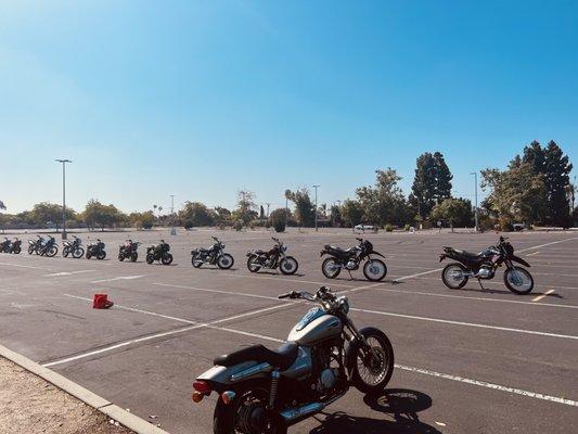 Motorcycles lined up at the beginning of class