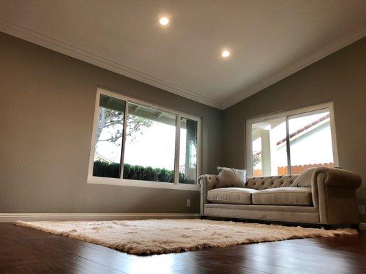 Repose grey, triple pane windows, recessed lighting, crown molding, brand new baseboards and floor!!