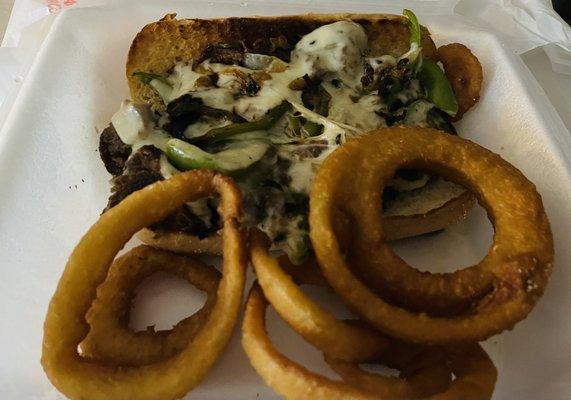 Philly Cheesesteak Sandwich and Onion Rings. Both were worth the order! Really good!