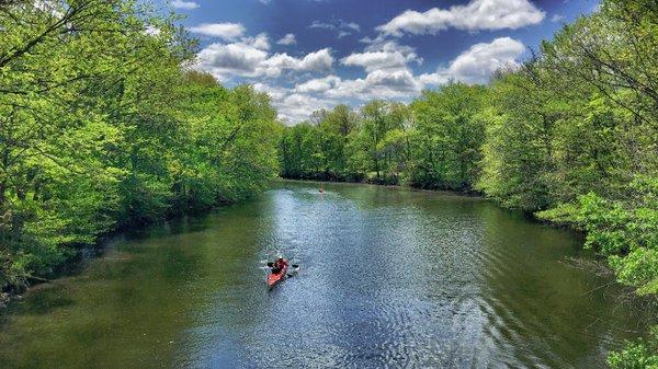 Paddle upstream towards the Mystic Lakes