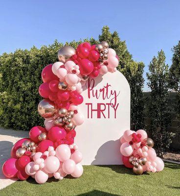 Our Single Arch backdrop and balloon garland with custom signage