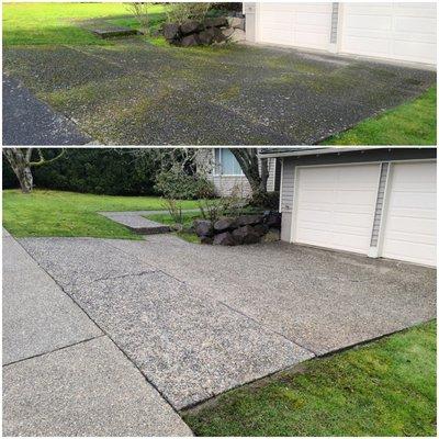 Pressure washing the driveway to keep things clean and safe.