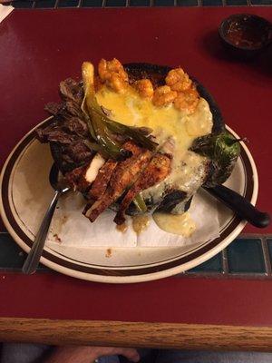 Molcajete plate served in a traditional molcajete (mortar and pestle).