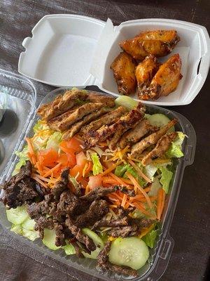 Buy a salad get however many wings for a $1 this day. I had a Steak & chicken salad with bourbon wings.