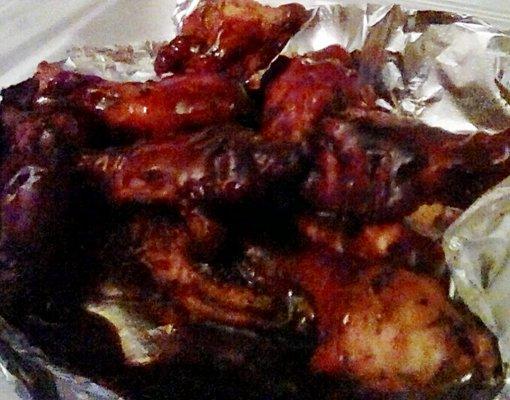 Delicious wings with a smoky, honey barbecue sauce. They grill the wings first.