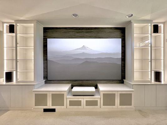 The screen (10 ft. diag) and projector were installed by a third party.  Speakers at different heights are for use with Dolby Atmos.