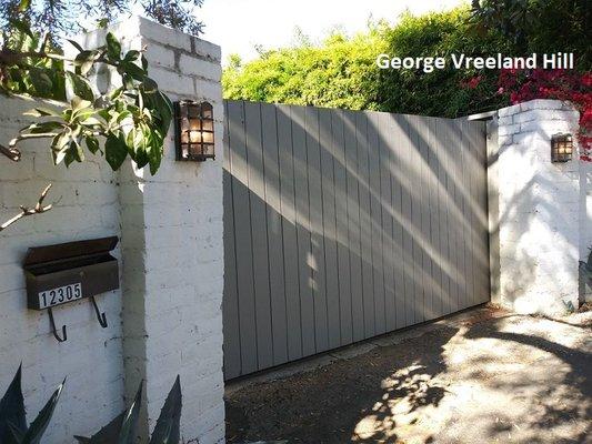 The gate to the home where Marilyn Monroe died in on 5th Helena Drive in Brentwood, California. 
 Photo by, George Vreeland Hill