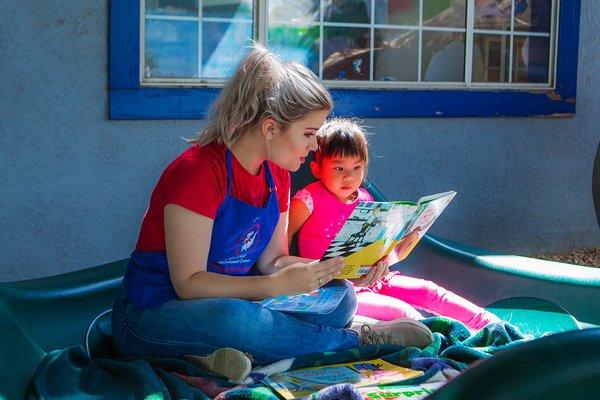 Outdoor reading at Kids Klub Pasadena.